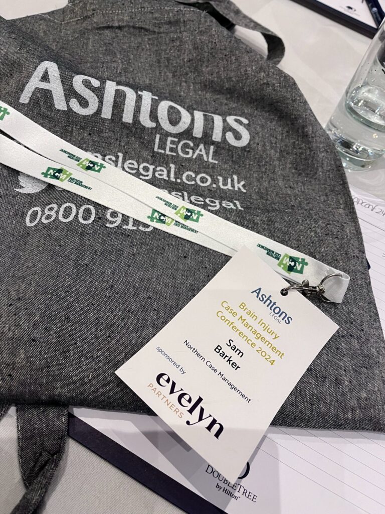 Ashtons legal conference bag and lanyard, with samantha barker's name on.